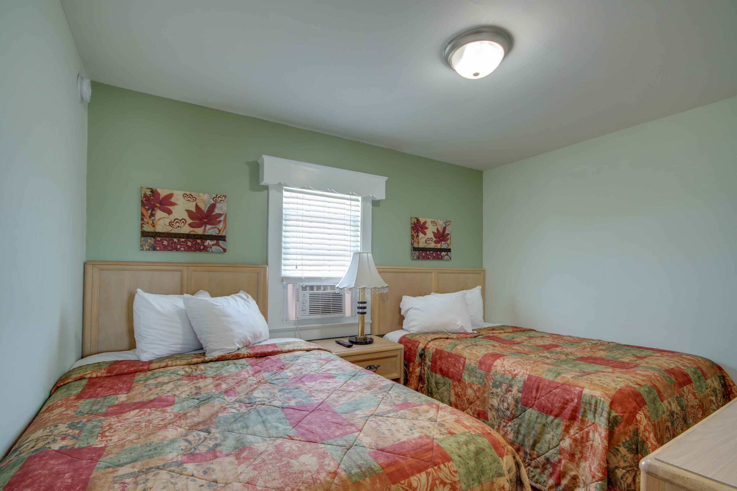 apartment bedroom with two beds