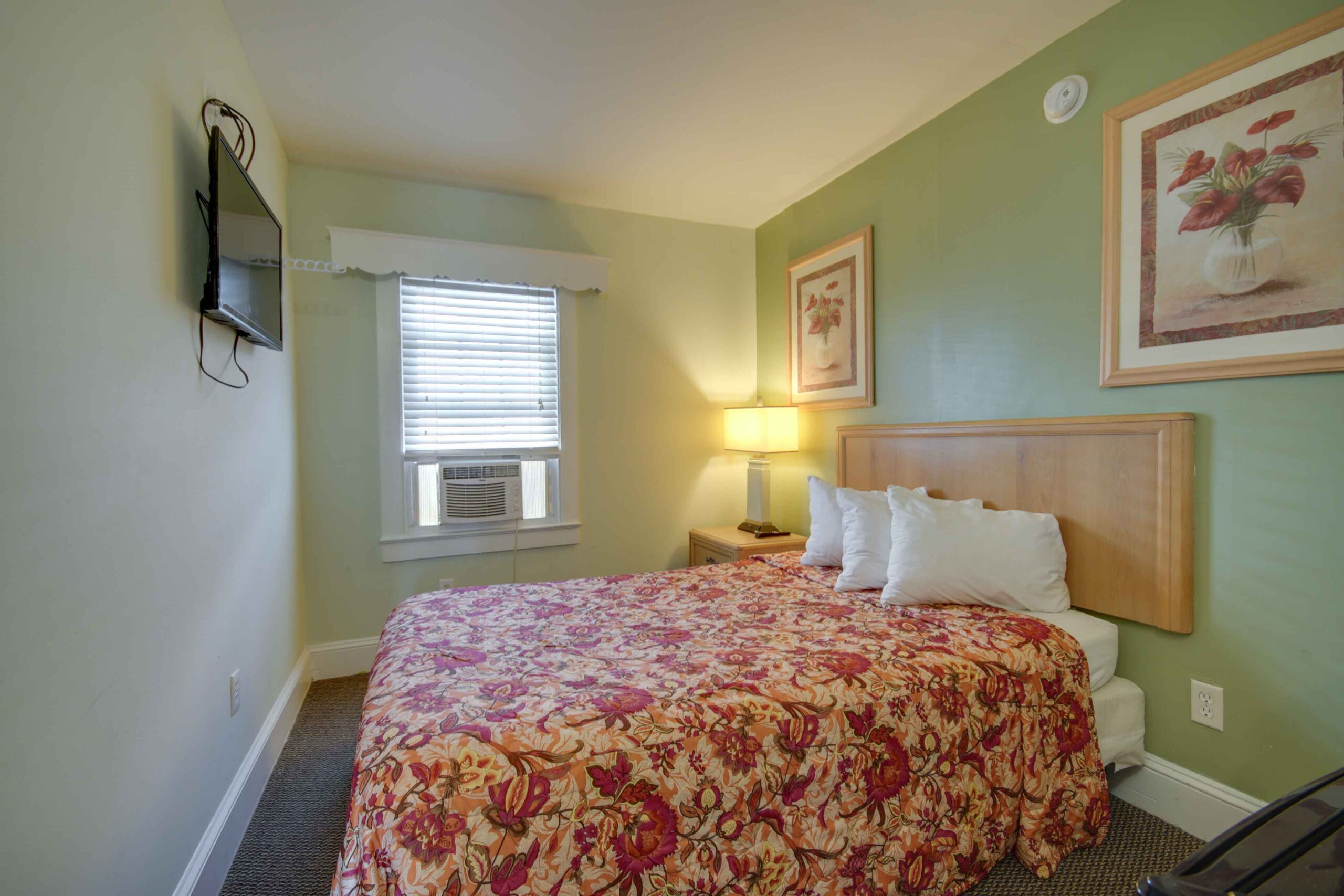 hotel room with one double bed