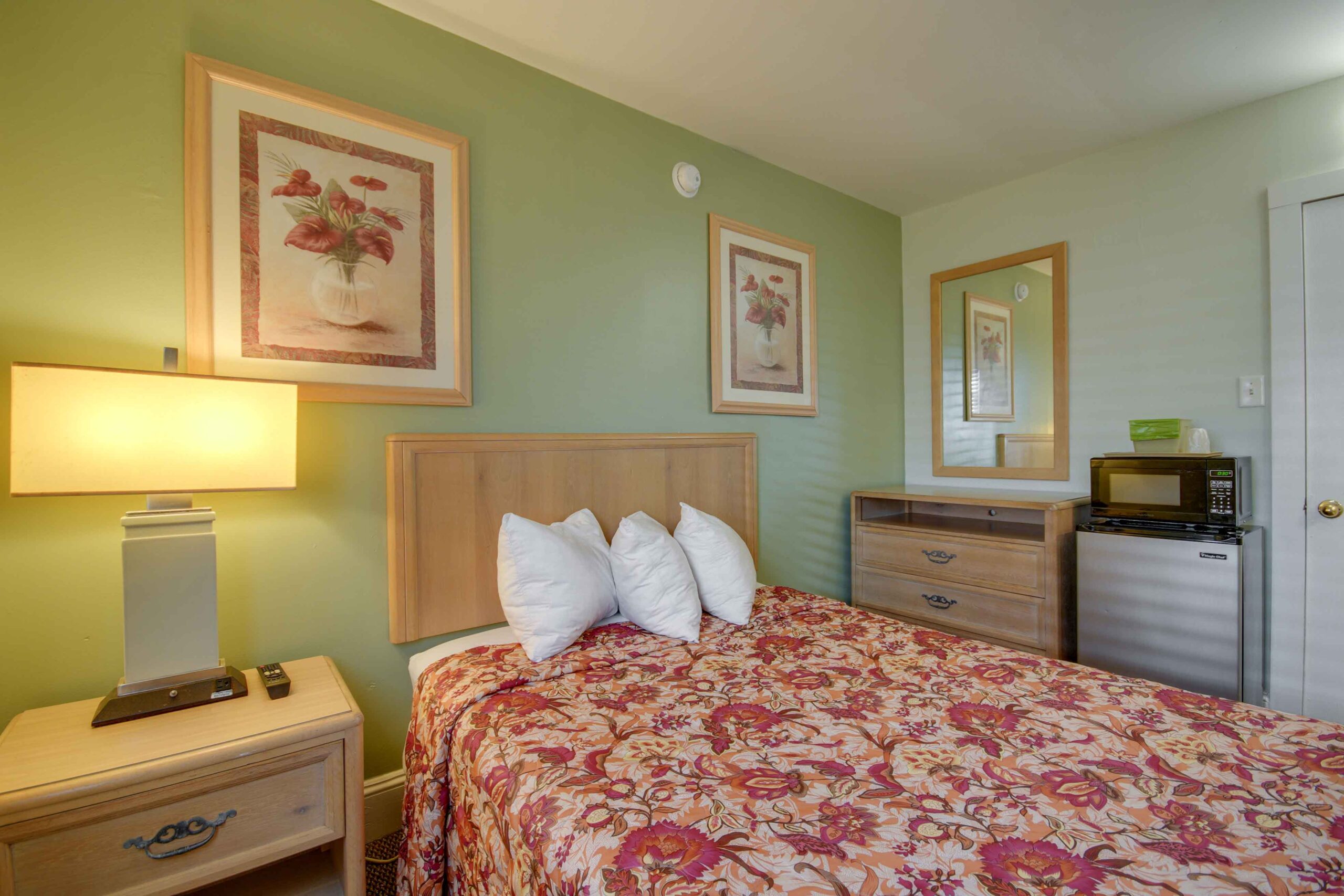 hotel room with one double bed