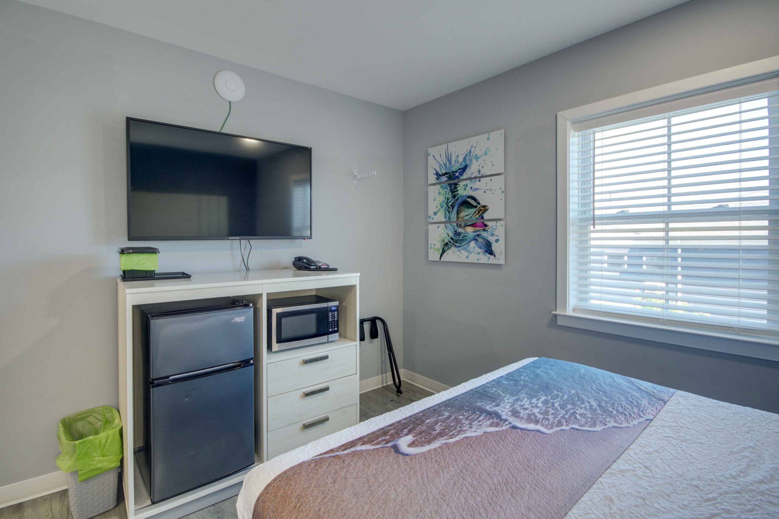hotel room with fridge