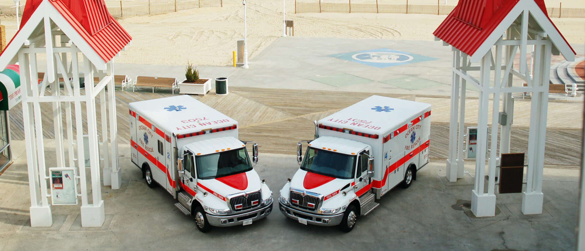 Two ambulances parked on the Ocean City, Maryland boardwalk.