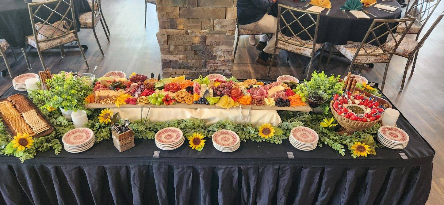 Large buffet table full of food at OC Golf Club