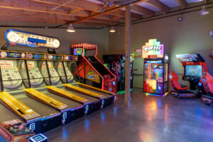 a room with several arcade machines in it