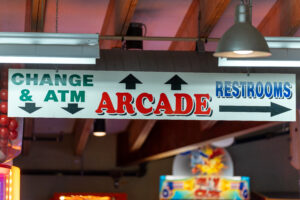 a street sign hanging from the ceiling of a restaurant