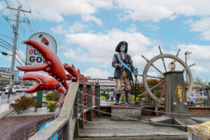 a statue of a pirate on a boat