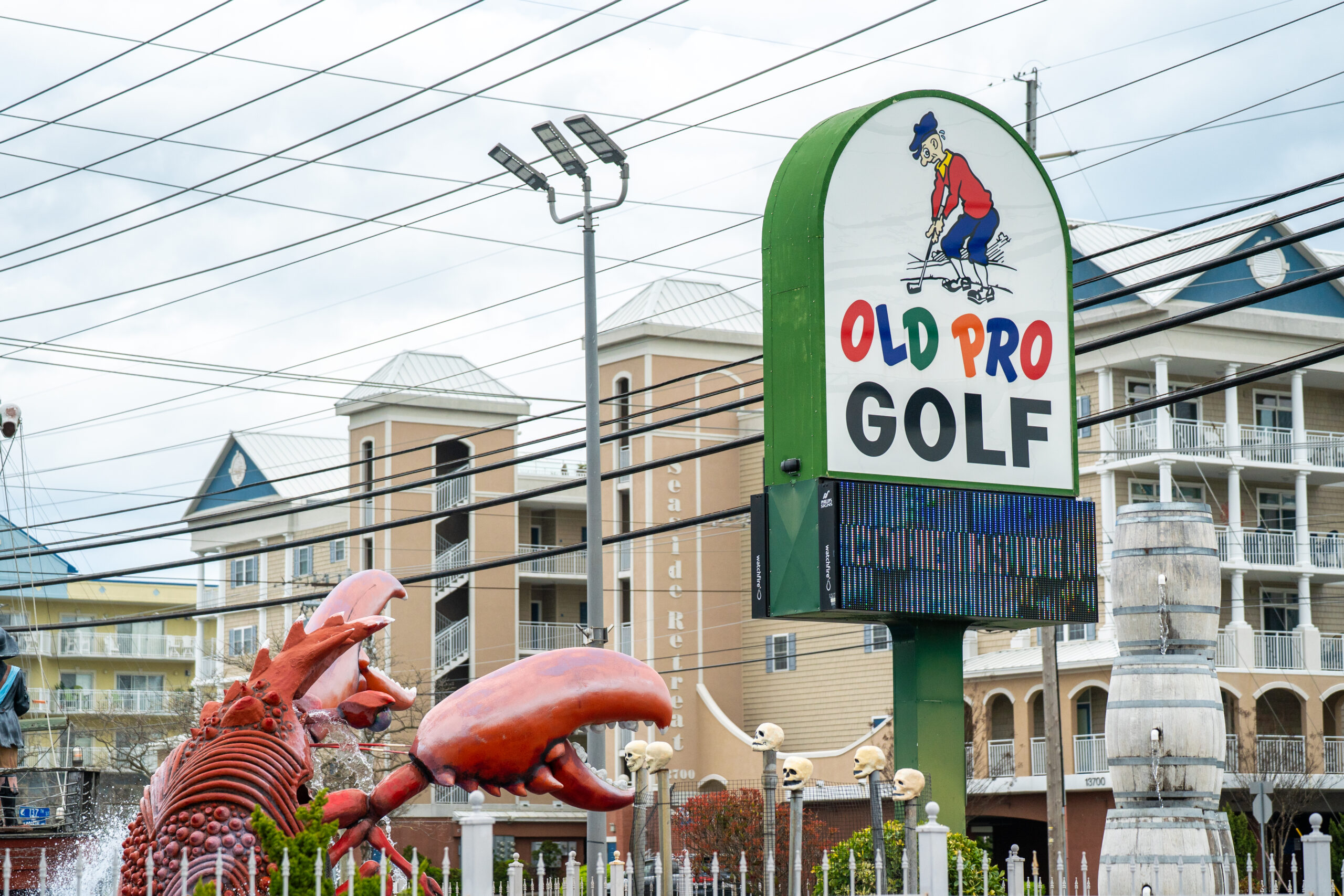 a couple of large statues of animals in front of a building