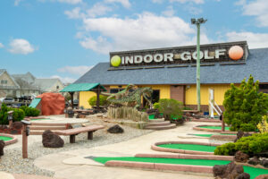 a miniature golf course in front of a building