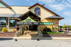 a building with a sign that says beer united