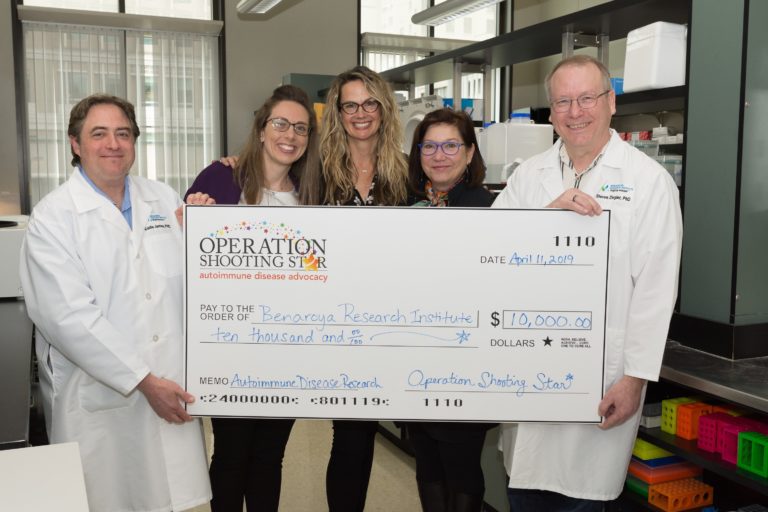 Audrey Killen and Gretchen Schoenstein of Operation Shooting Star presented a check for $10,000 to BRI.