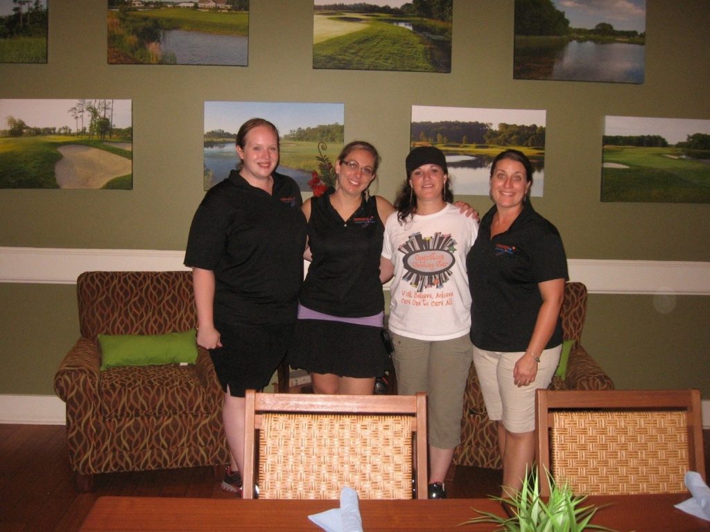 4 women OSS members posing together