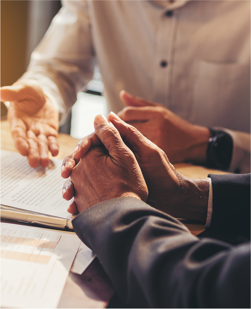 Professionals sitting around a table consulting