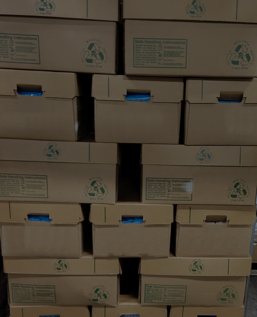 Stacks of coated brown boxes