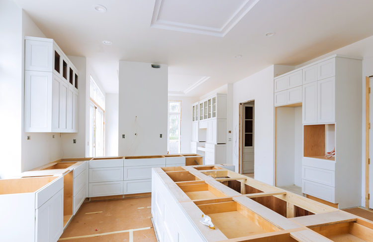 a kitchen with a lot of cabinets in it
