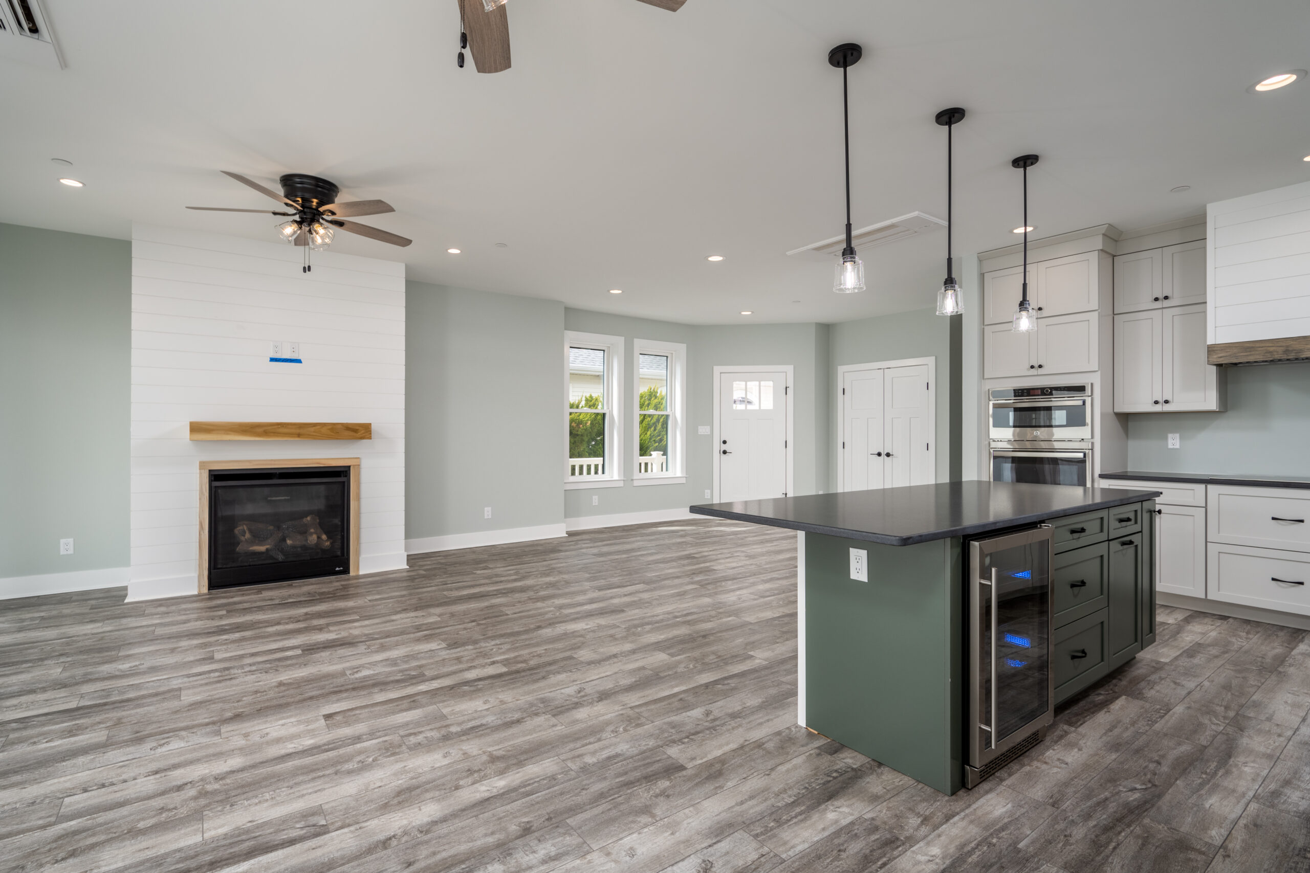 a large kitchen with a large center island