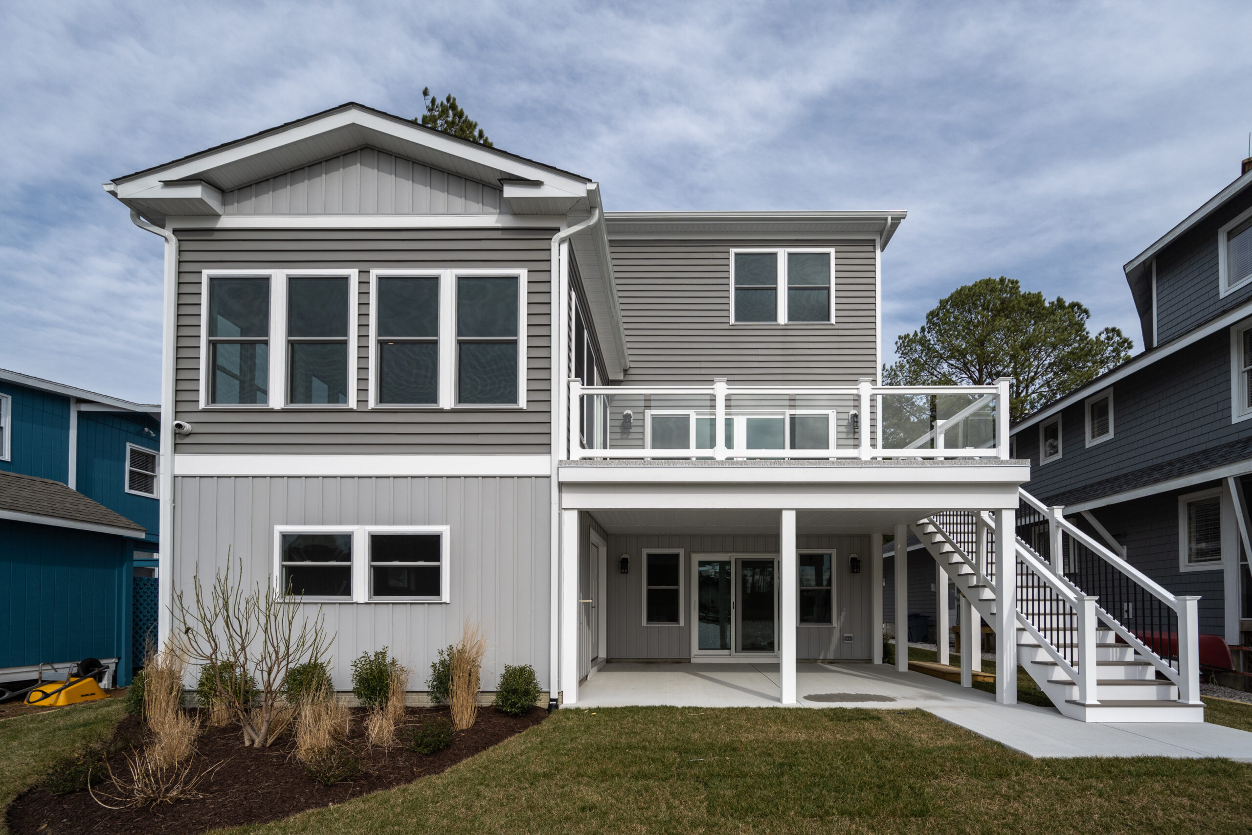 a two story house with a large front yard