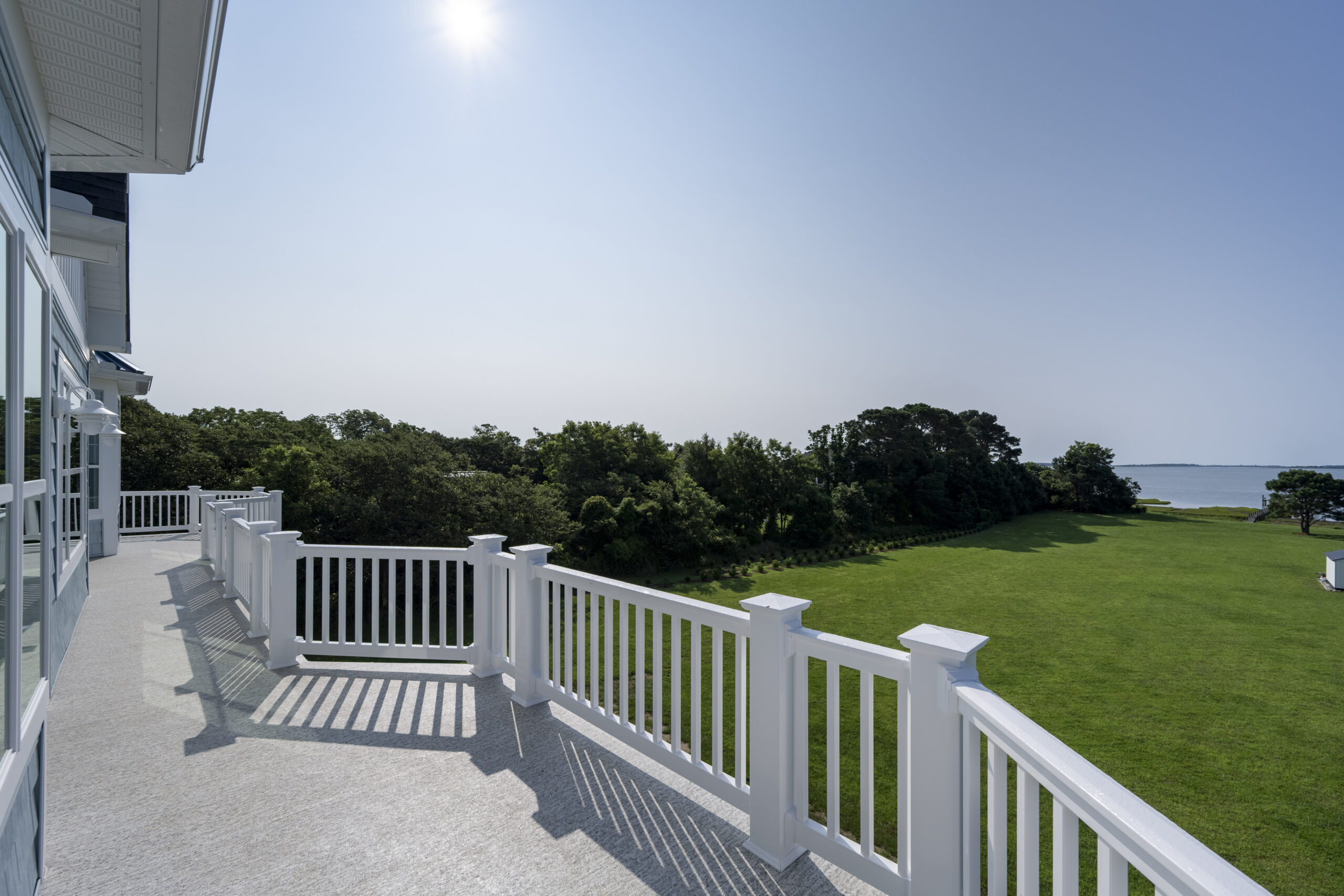 a balcony with a view of the ocean