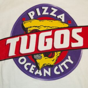 a white shirt with a pizza logo on it
