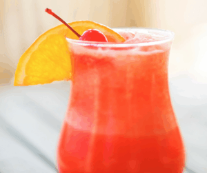 a drink with an orange slice and a cherry in it