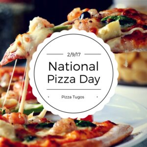 a plate of pizza with a national pizza day sign on it