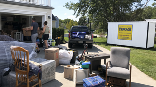 Storage units moving delay Centreville MD with moving boxes and furniture in a clean unit