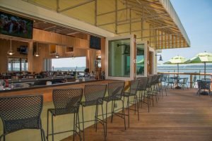 out door patio of bridges restaurant on the eastern bay