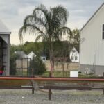 a building with a fence in front of it