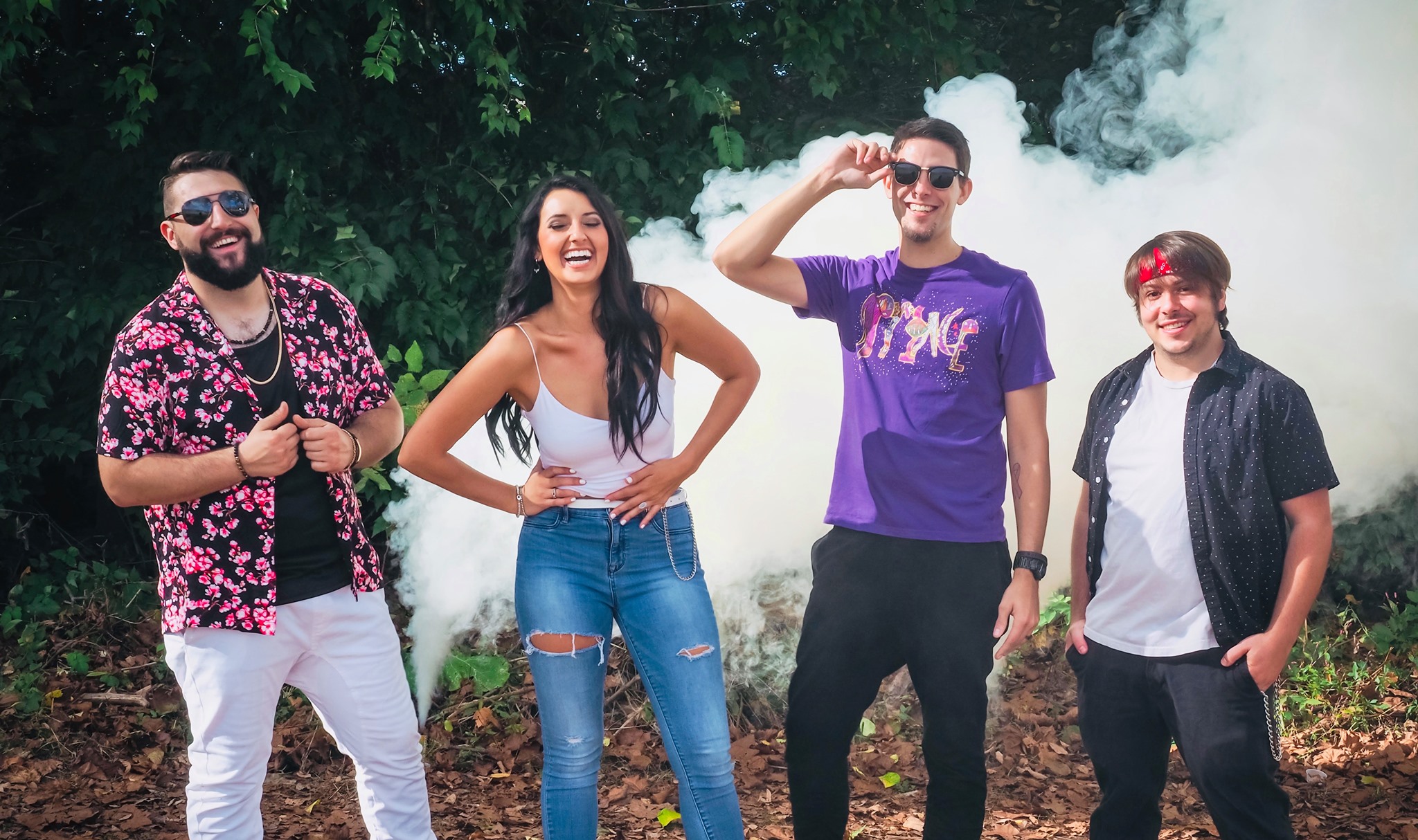 a group of people standing next to each other