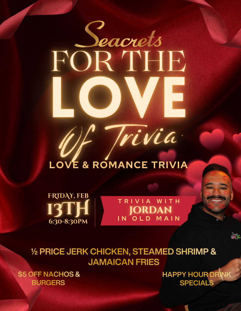 a man standing in front of a red curtain