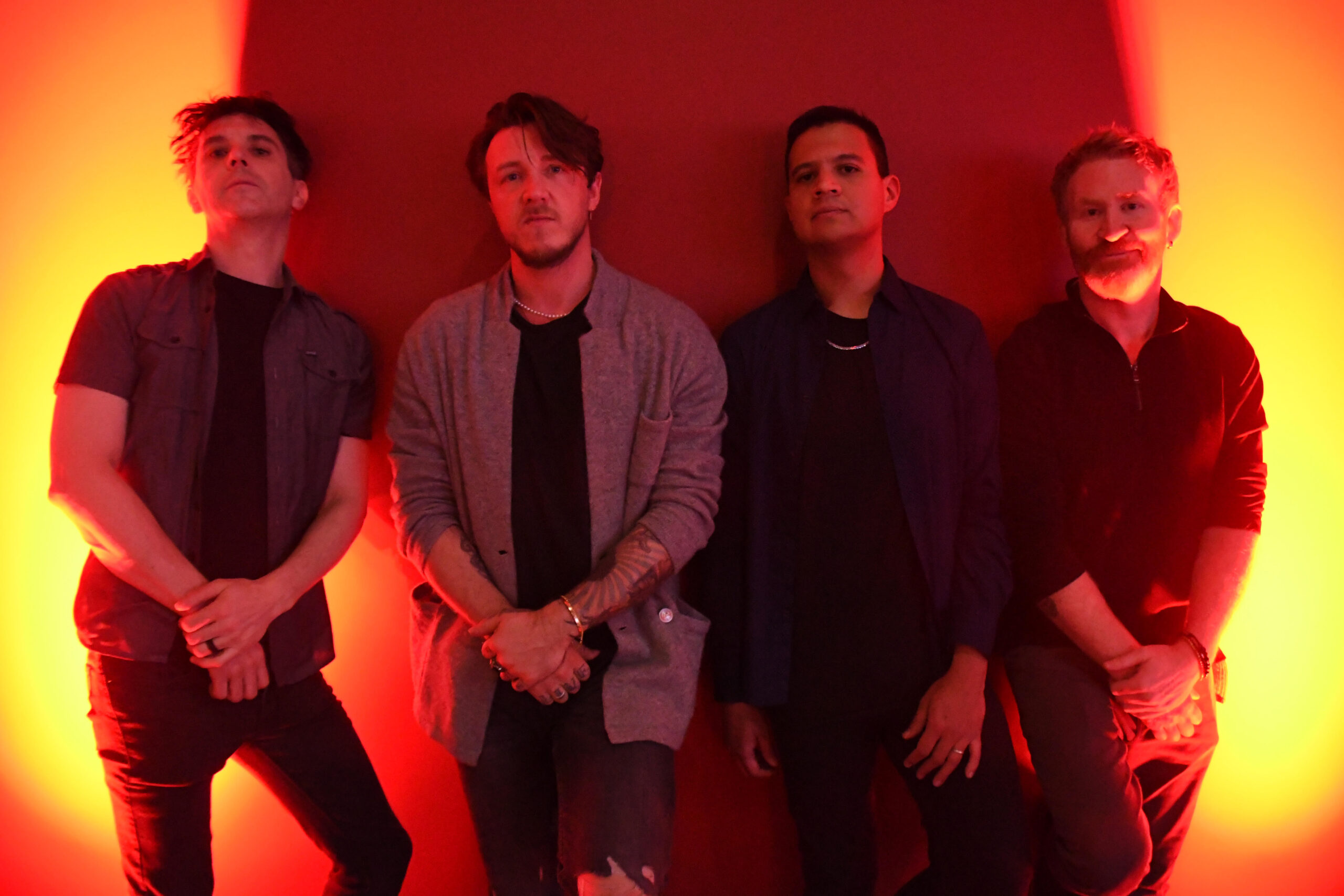 a group of men standing next to each other