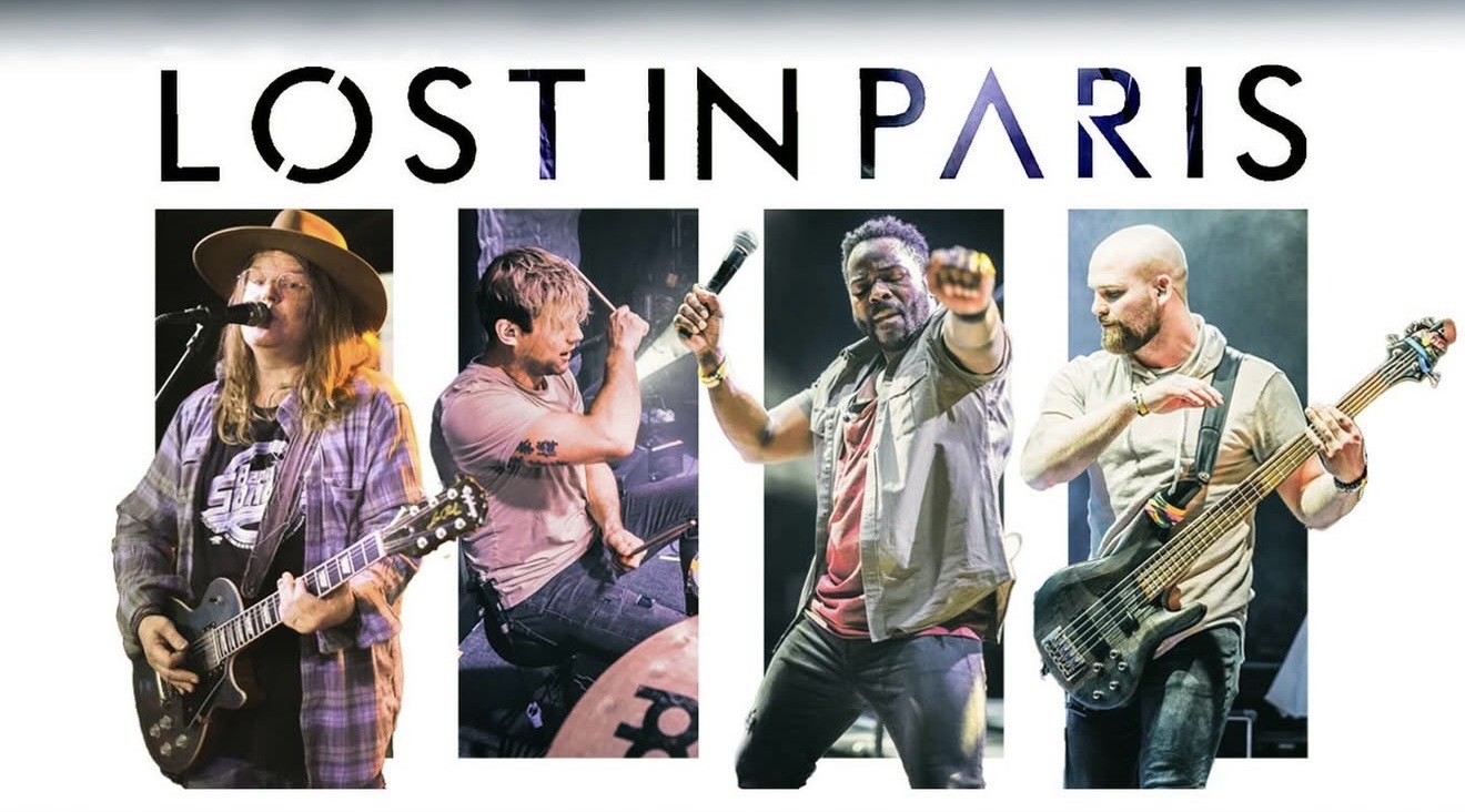 a group of people that are playing guitars