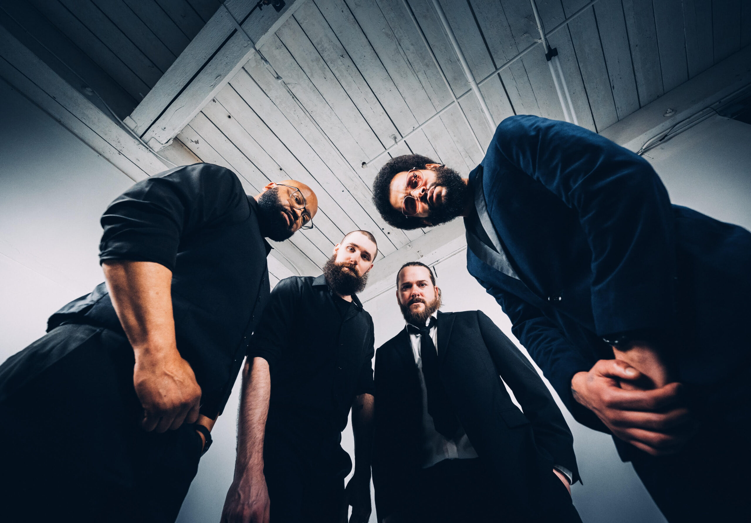 a group of men standing next to each other