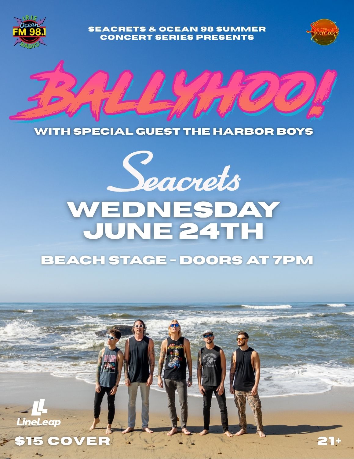 a group of people standing on top of a beach