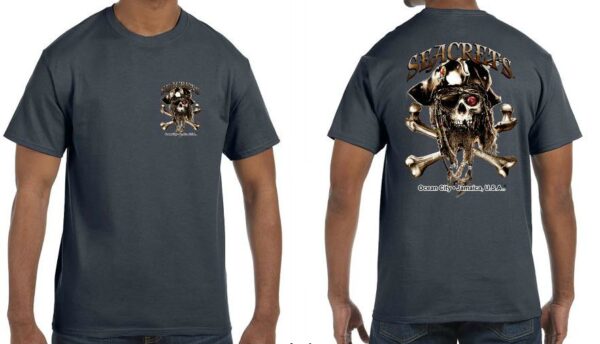 a man wearing a t - shirt with a skull and crossbones on it