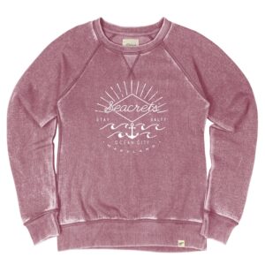 a women's sweatshirt with a graphic on the front