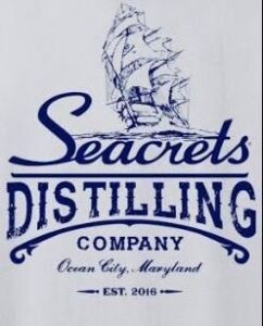 a white t - shirt with the words seacrests distilling company on