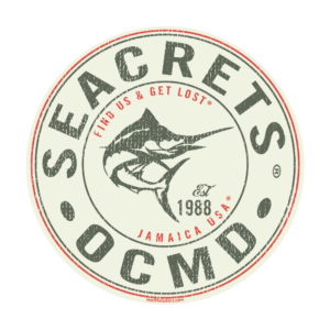 a white and red seal with a fish on it