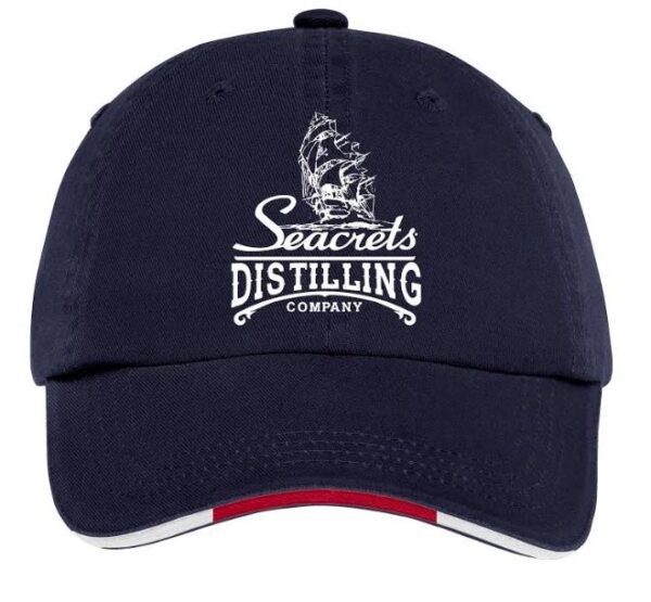 a navy hat with a white logo on it