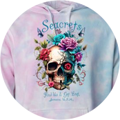 a tie dye hoodie with a skull and roses on it
