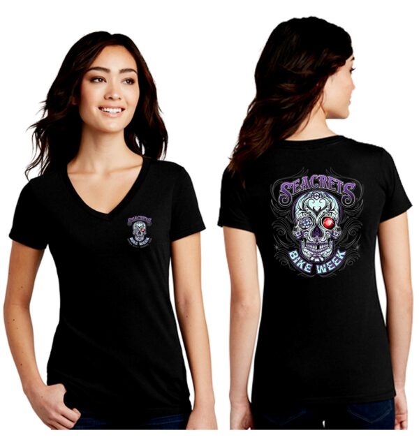 a woman wearing a black shirt with a skull on it