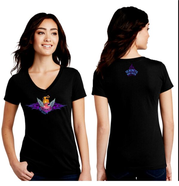 a woman wearing a black shirt with a dragon on it