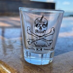 a glass bottle with a skull and crossbones on it