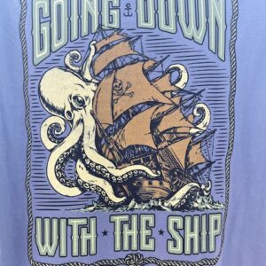 a blue shirt with an octopus and ship on it