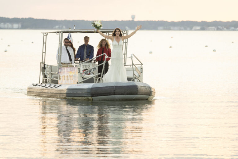 a group of people on a boat in the water