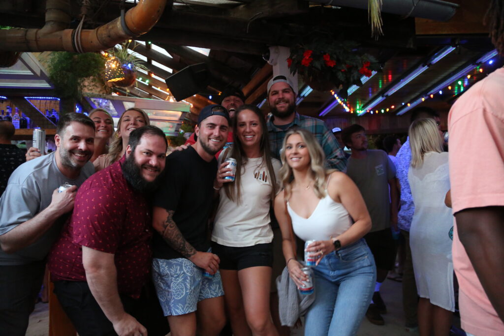 a group of people standing next to each other