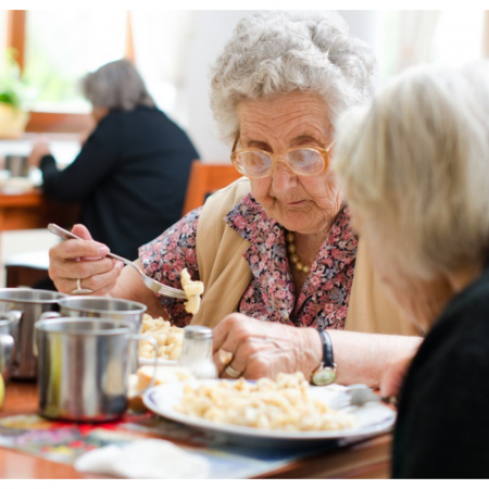 senior women eating in cafeteria