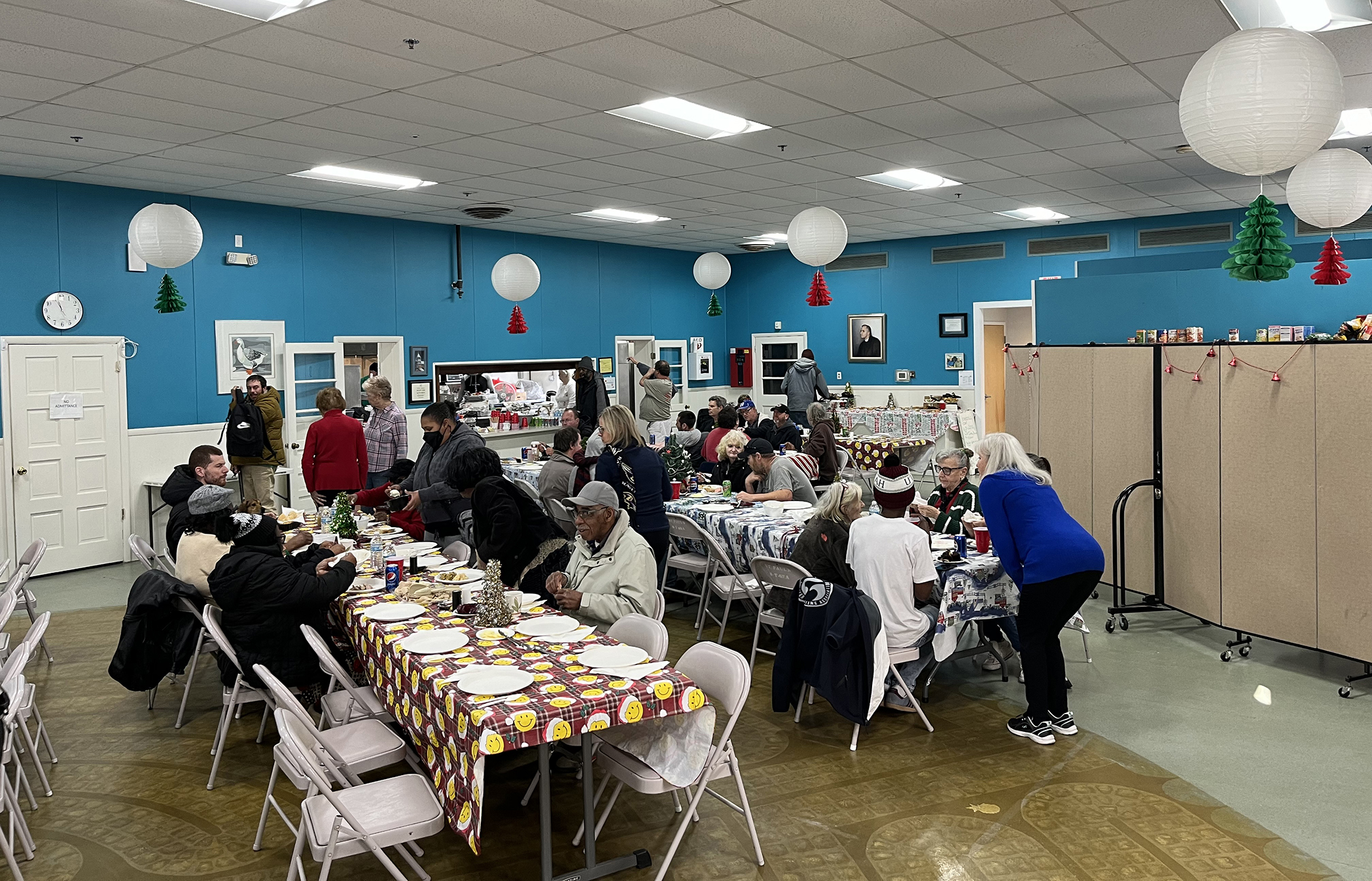a group of people sitting at tables in a room