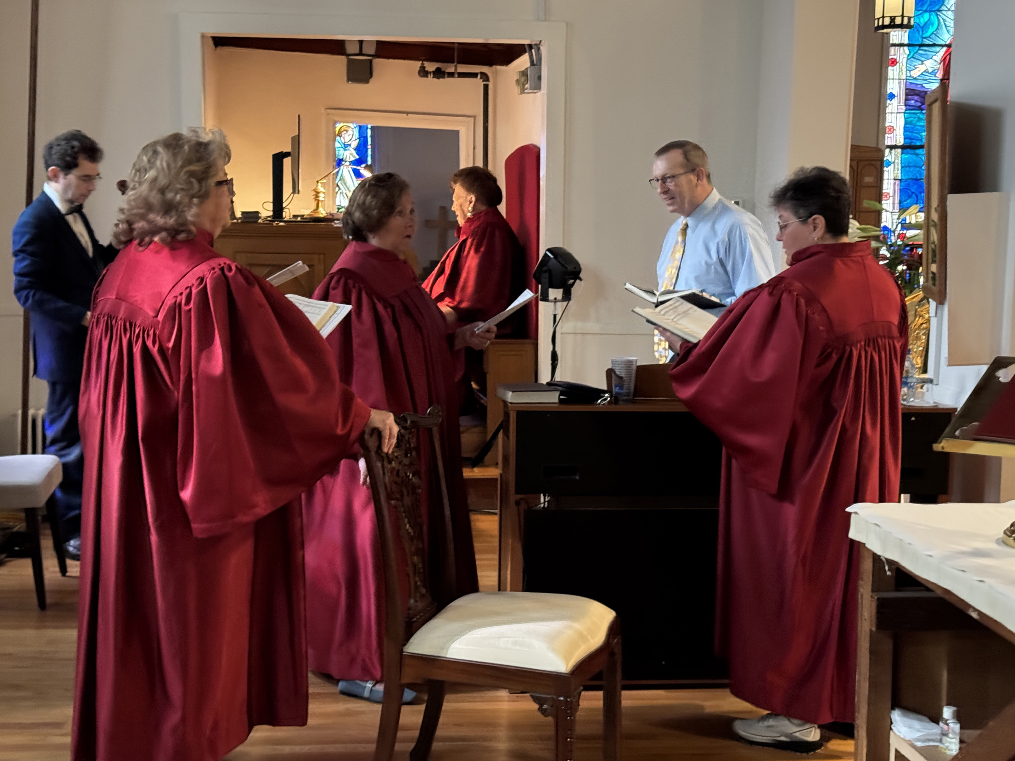 Choir practicing before Christmas Eve service