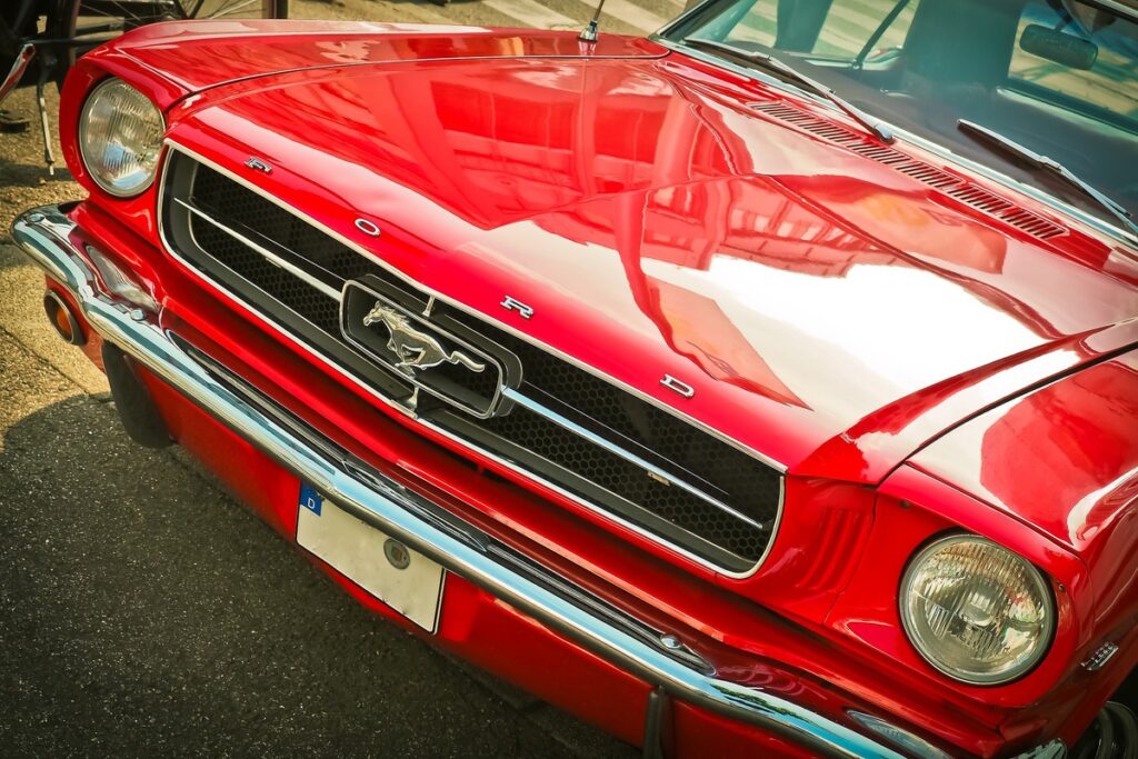 a red car parked on the side of the road