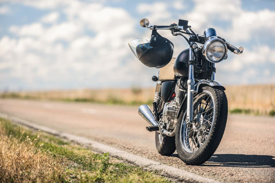 Black motorcycle parked on the road