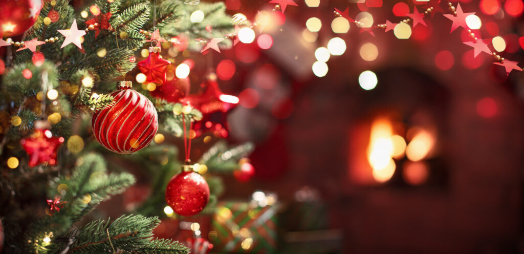 a christmas tree with red and gold ornaments